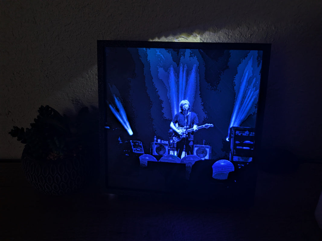 Illuminated 3D art piece of a live Phish show, showcasing glowing details and vibrant lighting effects.