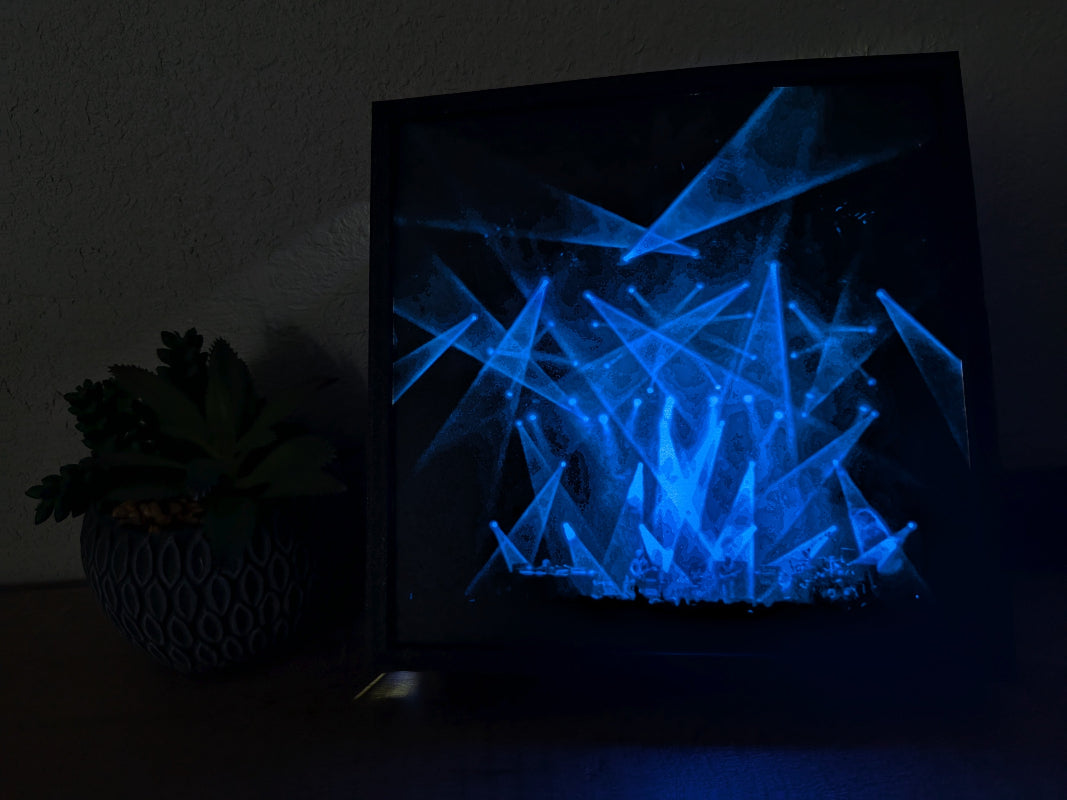 3D-printed illuminated art piece showcasing a blue light display reminiscent of a live Phish concert.